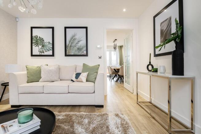 Sociable entertaining space leading through to the kitchen/dining area