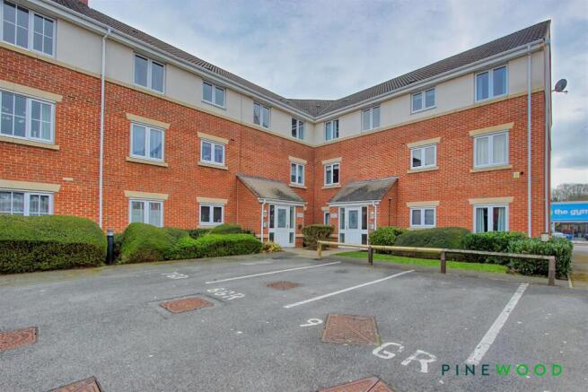 ENTRANCE AND CAR PARK