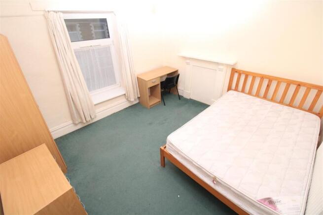 Bright double bedroom with dedicated study desk...