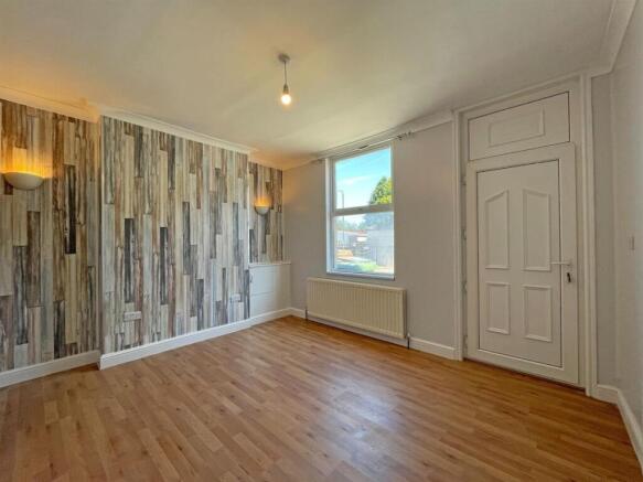 Spacious and bright living room with wooden flo...