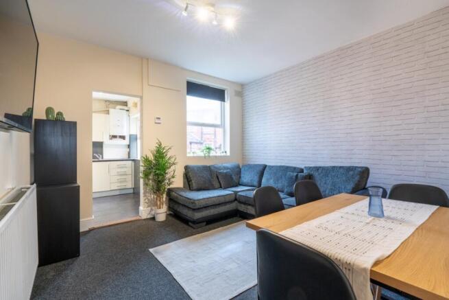 Bright and modern open-plan living room with a ...