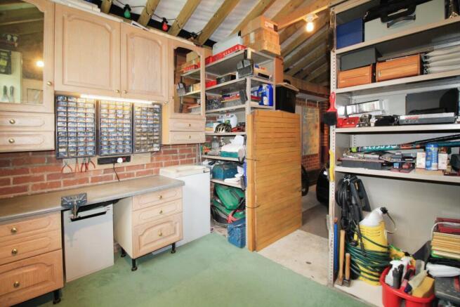 Workshop area to the rear of garage (1).JPG