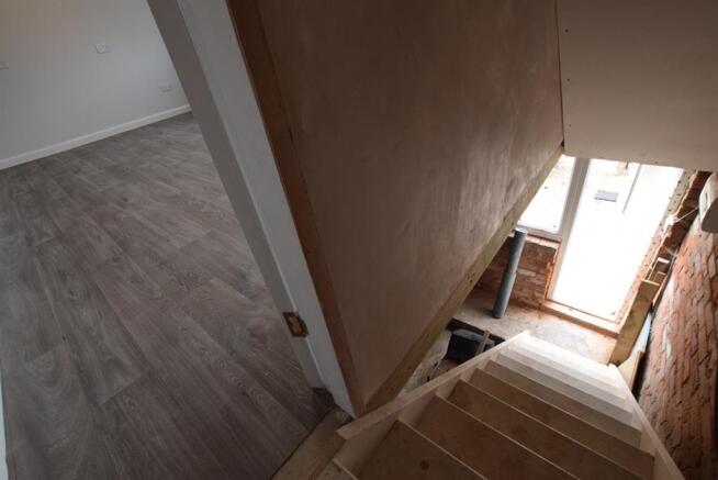 Stairs leading to 1st floor