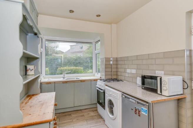 KITCHEN, SITTING ROOM AND LOUNGE