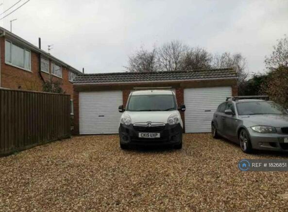 Garage (Middle) And Drive For 2 Vehicles