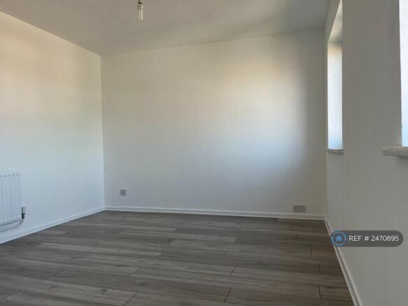 Front Bedroom With Two Windows