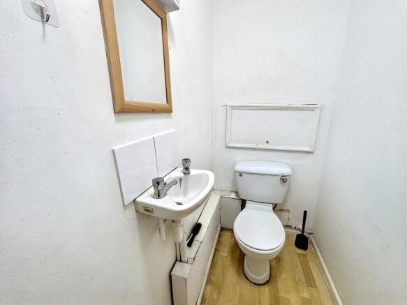 Clean and functional private WC with mirror...