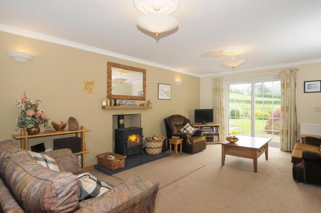Lovely through room with wood burner