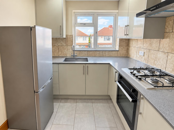 Clean, bright estate kitchen.png