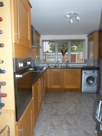 KITCHEN TO FRONT