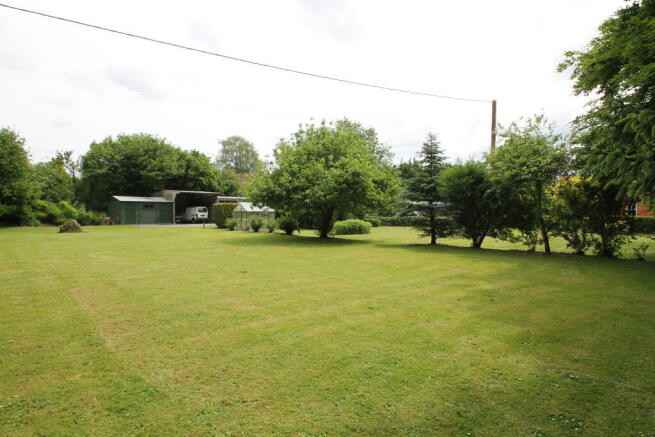 Lawn and outbuildings