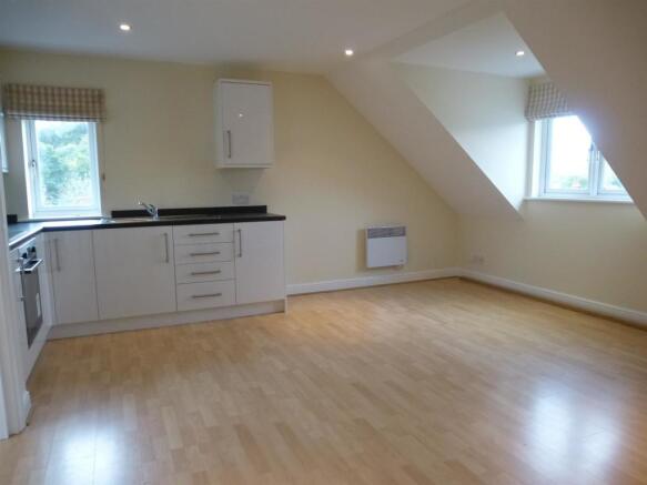 7 Courtenay House sitting room and kitchen.JPG