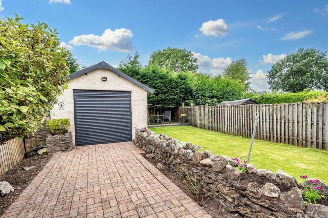 Garage with electric roller door