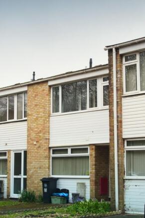 Charming terraced home with bright windows...
