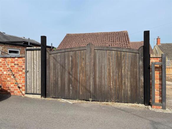 Gates at rear from College St.