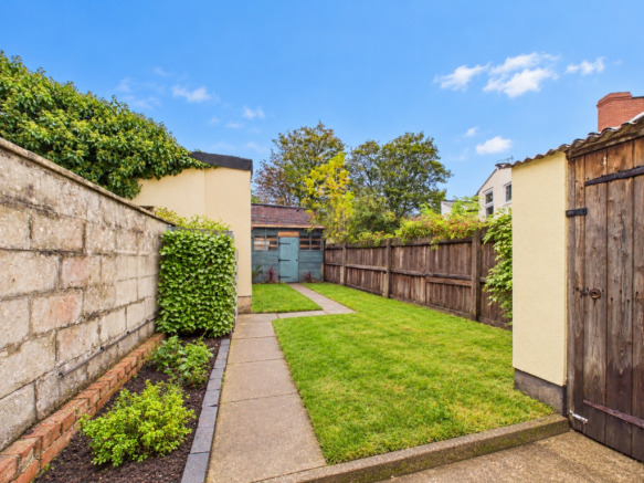 Bright, tidy garden under blue sky