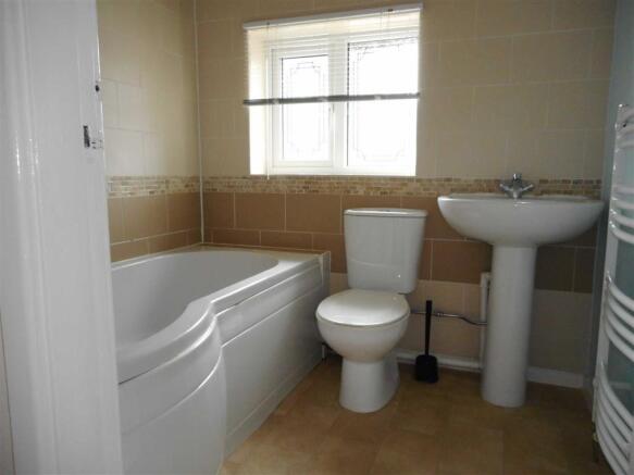 PART TILED FAMILY BATHROOM/WC