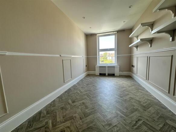 Elegant room with stylish parquet flooring...