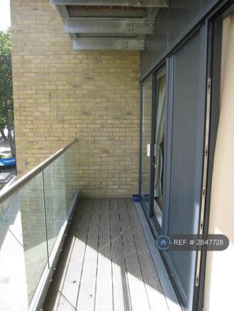 Balcony Accessed From Both Roomss