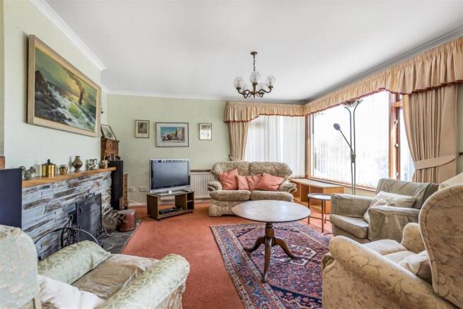 3. Sitting Room with Fireplace.jpg