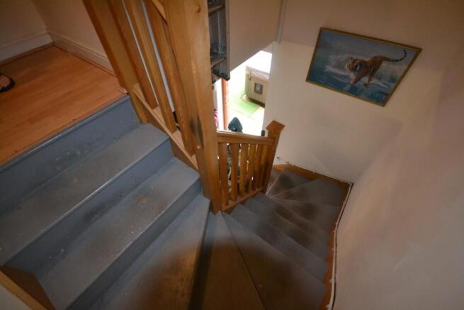 STAIRWELL TO OFFICE ABOVE GARAGE