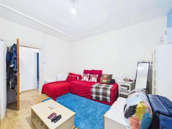 House arranged as two flats for auction, Totterdow