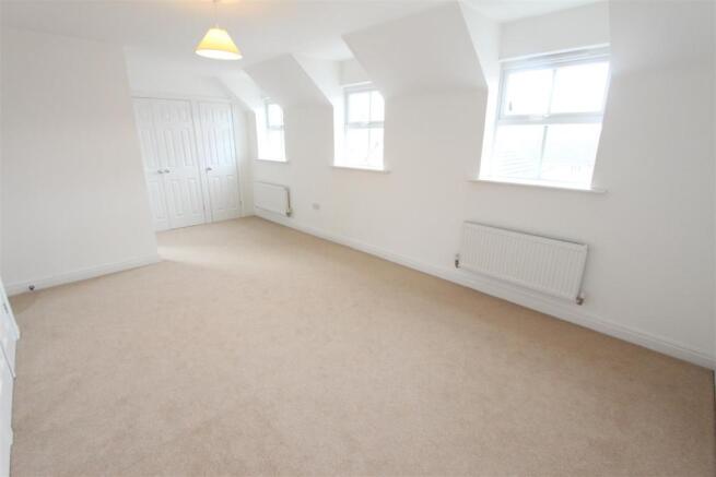 BEDROOM ONE TO FRONT