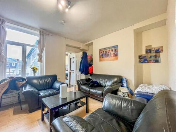 Bright and spacious lounge with comfy seating...