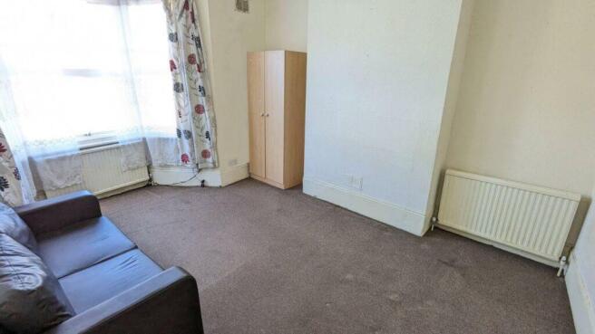 Reception room into bay window