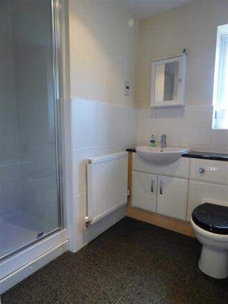 EN-SUITE SHOWER ROOM