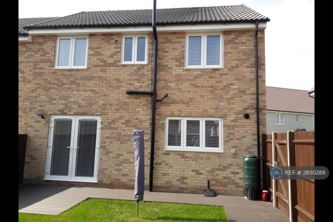 Secure Rear Garden With Grassy Area And Patio