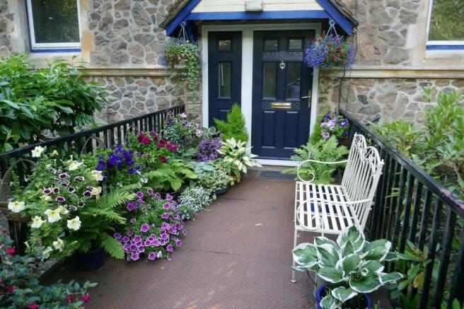 Entrance and cute seating area