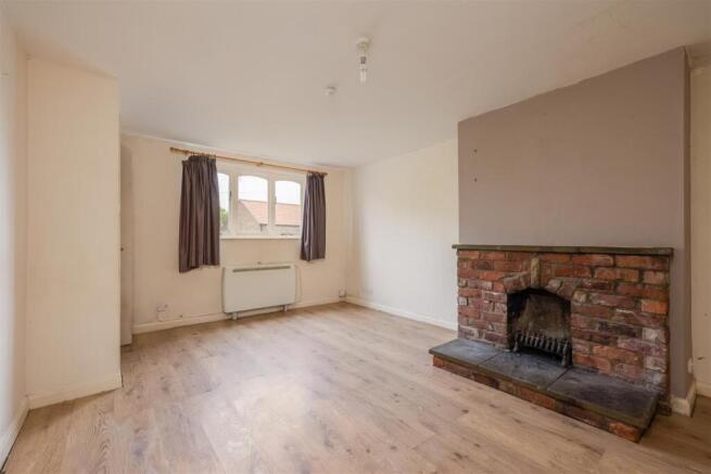 Warren Cottages 2 Sitting Room-1.jpg