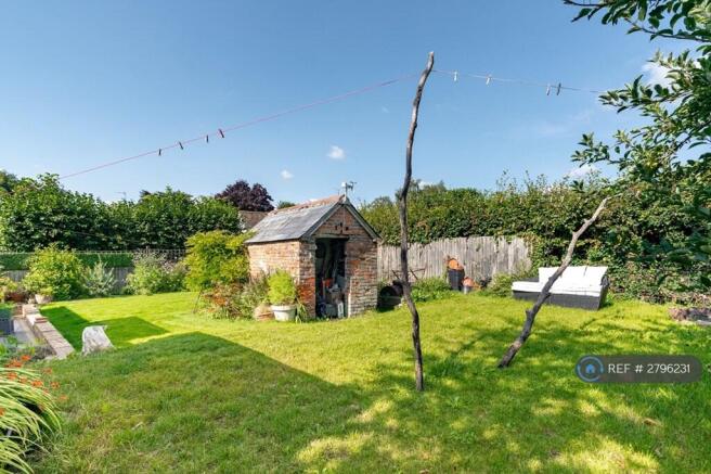Outhouse: Lawnmower Storgage