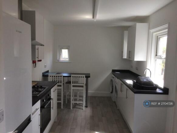 Kitchen With Dining Area