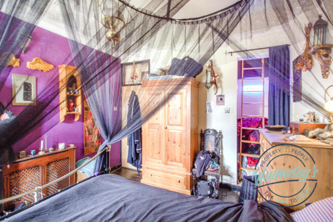 Rear bedroom with loft access