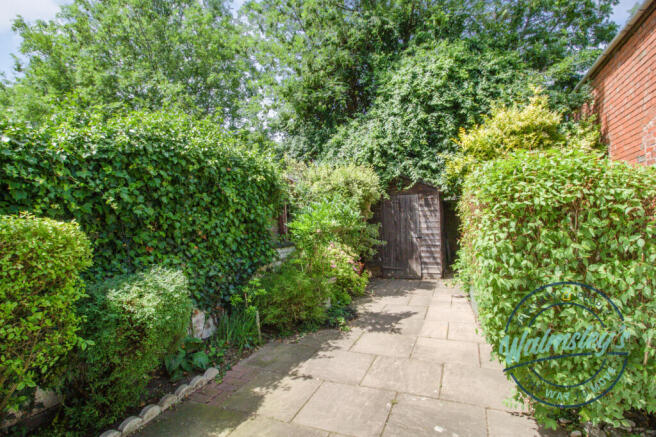 Rear gardens with shed at rear and side gate acces
