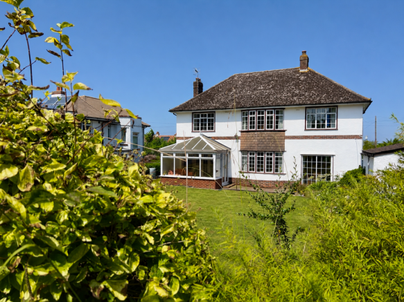 A Rare 1930s Home with Exceptional Gardens & Outstanding Potential photo 4