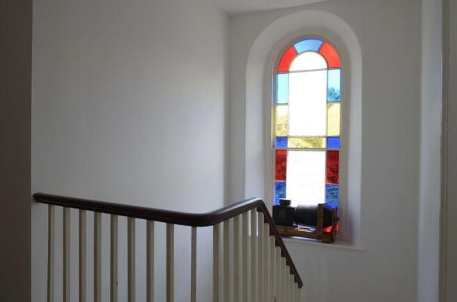 Landing Arch Window