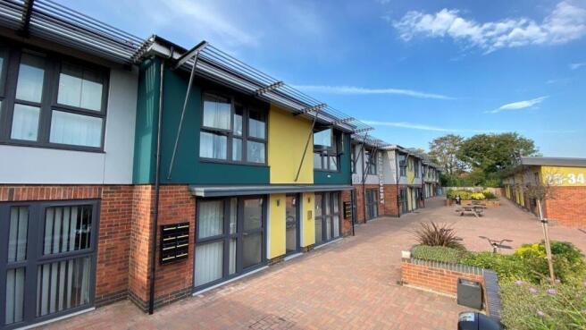 Bright modern exterior with vibrant facades...
