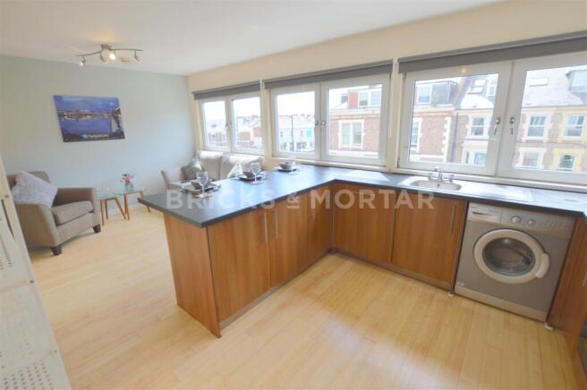 Flat 3, 24 Portland Terrace Lounge Kitchen (2).jpg