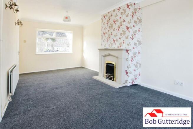 THROUGH LOUNGE/DINING ROOM