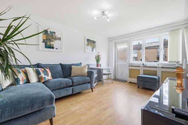 Lounge/Dining Room with door leading to the rear a