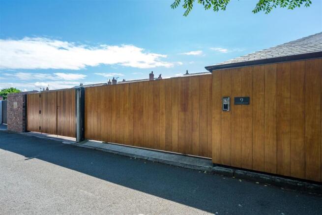 Gated Rear Parking and Entrance