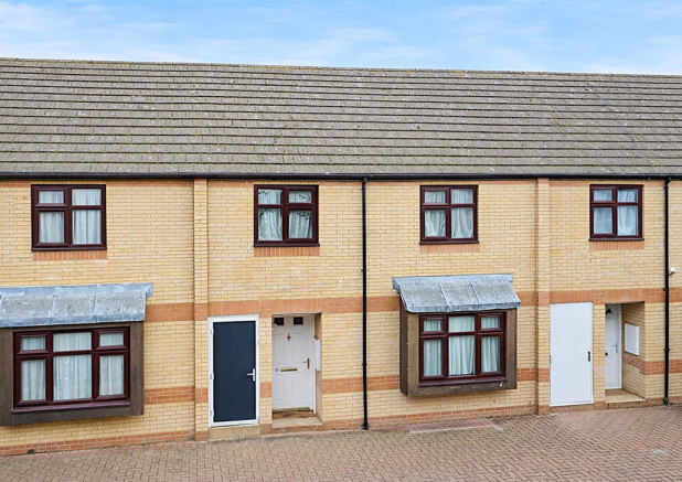 Traditional terraced houses in daylight.png
