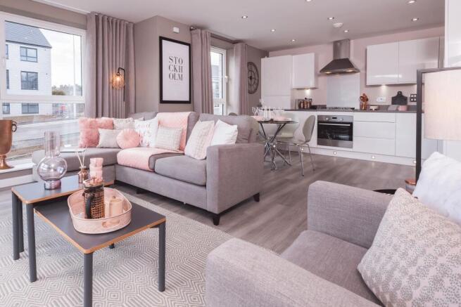 Example of an open plan kitchen/living room within an apartment