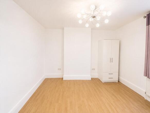 Bright and spacious bedroom with stylish decor...