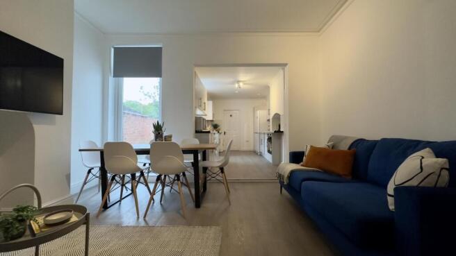 A spacious and bright modern living room, perfe...