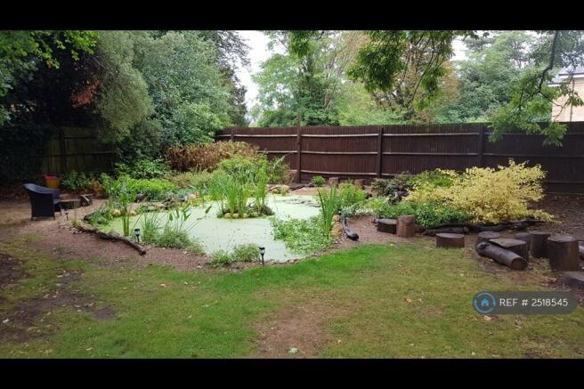 Pond In Rear Garden Area