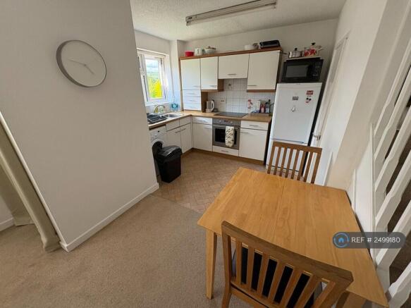 Living Room With View Of Kitchen
